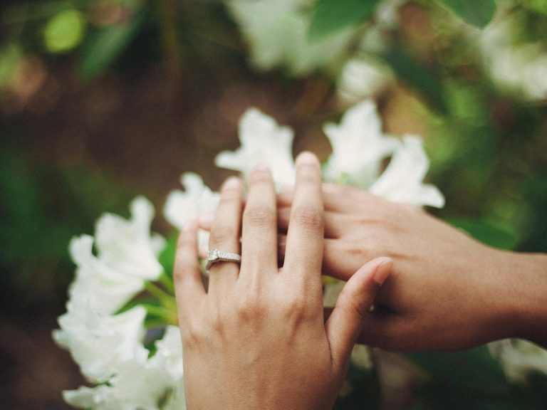 pexels-photo-1094995 person holding flowers
