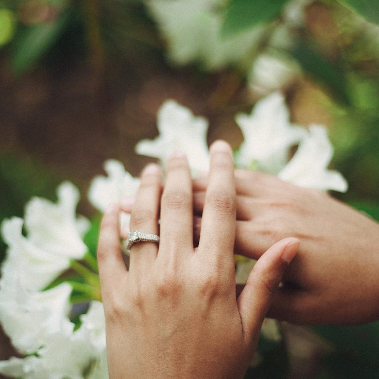 pexels-photo-1094995 person holding flowers