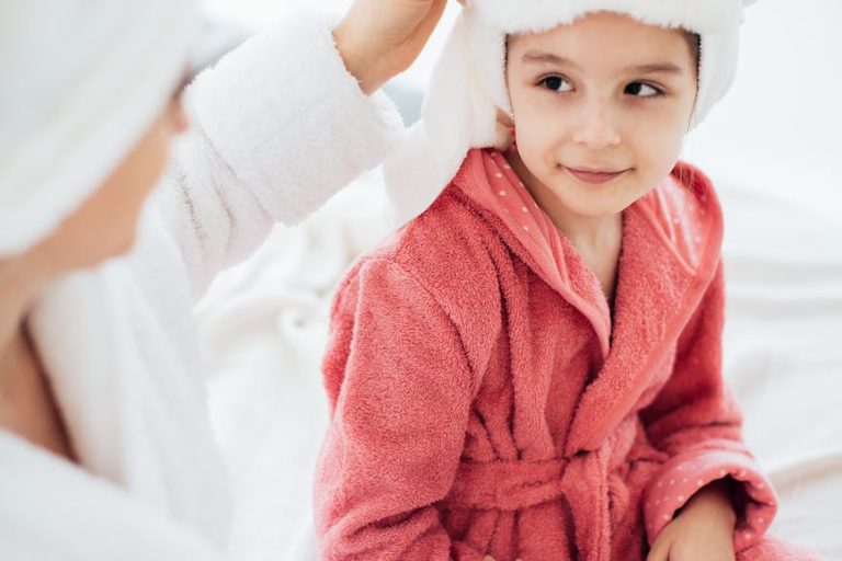 pexels-photo-6202209 mother and daughter in dressing gowns and with their hair wrapped in a towel