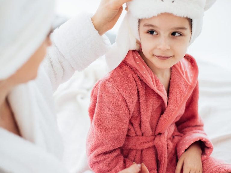 pexels-photo-6202209 mother and daughter in dressing gowns and with their hair wrapped in a towel