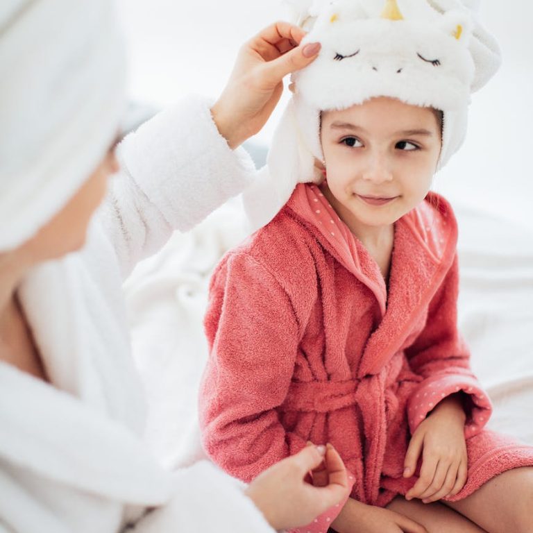 pexels-photo-6202209 mother and daughter in dressing gowns and with their hair wrapped in a towel